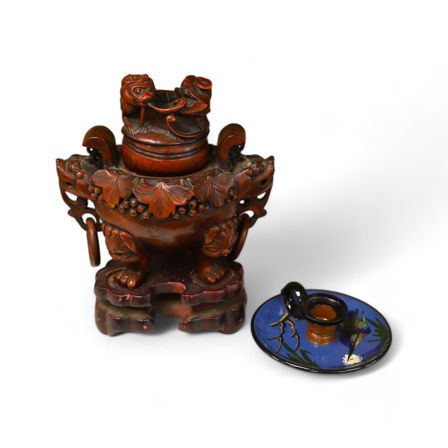 A Chinese composition tripod censer and cover, wood stand, 22.5cm high. Condition - fair